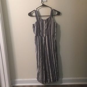 blue jean and white bell bottom overalls